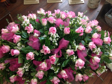 Pink roses coffin spray
